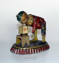 1915 Issmayer Distler German Wind-up Tin Toy Strongman RED Base 1 of 1 Known