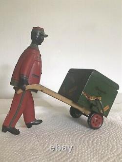 1920 STRAUSS TIN TOY RED CAP PORTER With DOG POPPING OUT OF TRUNK