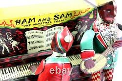 1921 Ham and Sam The Minstrel Team Tin Wind-Up Piano Player & Banjo Dancer