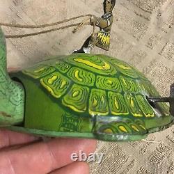 1930's J. Chein & Co. Tin Litho Wind Up Toy Turtle African Native Riding Working