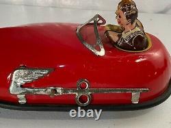 1930's Lindstrom Skeeter Bumper Car with Riders Tin Clockwork Windup Toy