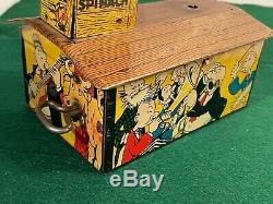 1930's Marx Tin Windup Popeye & Olive Oyl Jigger on Roof Character Toy