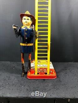 1930s MARX Smokey Joe Fireman Climbing Ladder Wind Up Tin Toy