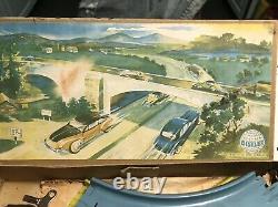 1940s DISTLER ORANGE TIN WIND UP TOY CAR, TRACK IN BOX US ZONE GERMANY WORKS