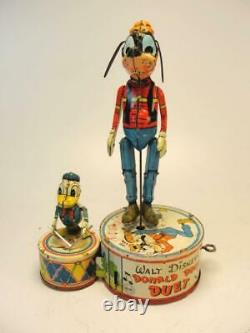 1945 Louis Marx Co. Walt Disney Donald Duck Duet Tin Wind Up Jigger Toy Goofy