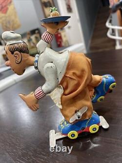 1950's TPS WIND UP ROLLER SKATING CHEF