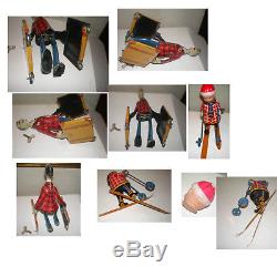 2 Vintage Tin Toys- Occupied Japan Tin Wind Up Skier+suitcase Man-both Work