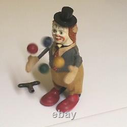 4SCHUCO WIND-UP JUGGLING CLOWN NR. 965 WithREPRO. BOX AND KEY. FULLY OPERATIONAL