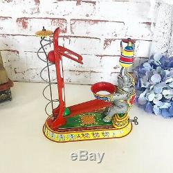 Antique Circus Elephant Wind-Up Tin Litho Toy, Vintage Circus spinning balls, US