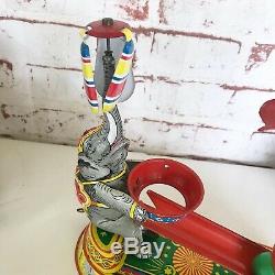 Antique Circus Elephant Wind-Up Tin Litho Toy, Vintage Circus spinning balls, US