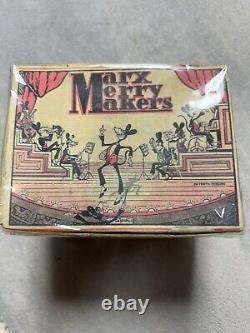 Antique Louis Marx Merrymaker Mouse Band Tin Toy. Circa 1930s with Original Box