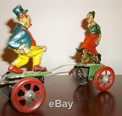 Antique Maggie and Jiggs Tin Windup Fighting Toy Works