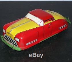 Antique Tin Wind Up Convertible Car made by Wyandotte 1939