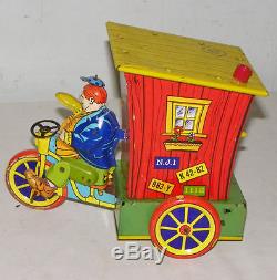 Antique Tin Wind Up Humphrey Mobile Toy by Wyandotte Toys