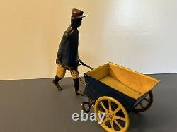 Antique Tip-Tip Black Porter Pushing Wheelbarrow Strauss Co. Wind-Up Toy