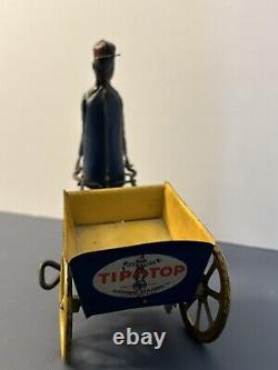 Antique Tip-Tip Black Porter Pushing Wheelbarrow Strauss Co. Wind-Up Toy