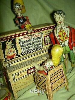 Antique, Unique Art Mfg. Co. Li'l Abner Dogpatch Band tin working wind-up toy