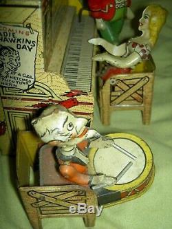 Antique, Unique Art Mfg. Co. Li'l Abner Dogpatch Band tin working wind-up toy
