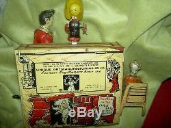 Antique, Unique Art Mfg. Co. Li'l Abner Dogpatch Band tin working wind-up toy