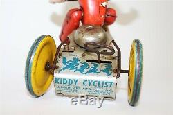 Antique Vintage Tin Litho Windup Toy Unique Art MFG Kiddie Cyclist on Tricycle