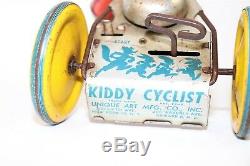 Antique Vintage Tin Litho Windup Toy Unique Art MFG Kiddie Cyclist on Tricycle