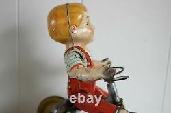 Antique Vtg UNIQUE ART KIDDY CYCLIST BOY IN TRICYCLE Wind Up Tin Litho Toy