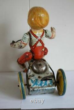 Antique Vtg UNIQUE ART KIDDY CYCLIST BOY IN TRICYCLE Wind Up Tin Litho Toy