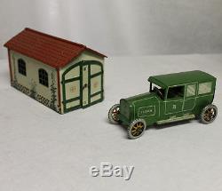 Antique tin wind-up Sedan Toy Car & Garage Lehmann Germany