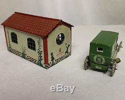 Antique tin wind-up Sedan Toy Car & Garage Lehmann Germany