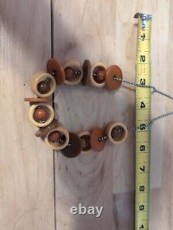 Bakelite Crib Toy. Circles Balls Discs Brown Amber Yellow Rare