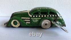 C. 1930's Marx Tricky Taxi Lithographed Tin Wind-up Car Looks & Works Great