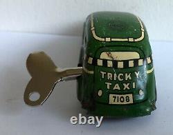 C. 1930's Marx Tricky Taxi Lithographed Tin Wind-up Car Looks & Works Great