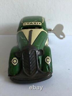 C. 1930's Marx Tricky Taxi Lithographed Tin Wind-up Car Looks & Works Great