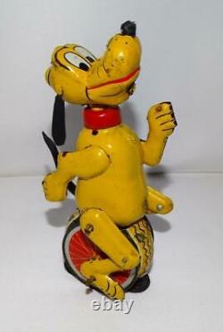 DISNEY 1950's PLUTO TIN LITHOGRAPHED UNICYCLIST LINEMAR WIND-UP TOY+LABEL