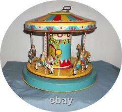 E770 Seldom Seen Nice Chein Top Wind Merry Go Round Works Great