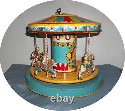 E770 Seldom Seen Nice Chein Top Wind Merry Go Round Works Great