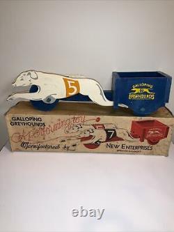Galloping Greyhounds A Performing Toy By New Enterprises Winston-salem, N. C