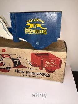 Galloping Greyhounds A Performing Toy By New Enterprises Winston-salem, N. C