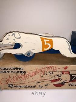 Galloping Greyhounds A Performing Toy By New Enterprises Winston-salem, N. C
