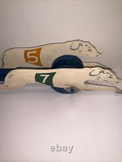 Galloping Greyhounds A Performing Toy By New Enterprises Winston-salem, N. C