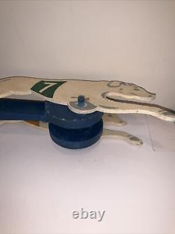 Galloping Greyhounds A Performing Toy By New Enterprises Winston-salem, N. C