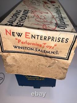 Galloping Greyhounds A Performing Toy By New Enterprises Winston-salem, N. C