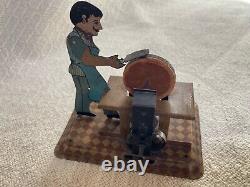 Girard 1930s Tin Litho Wind-up Flasho the Grinder with Key