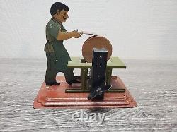 Girard 1930s Tin Litho Wind-up Flasho the Grinder with Key Germany