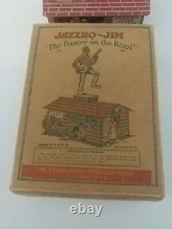 JAZZBO-JIM Dancing Tin Wind Up Toy THE DANCER ON THE ROOF 1921