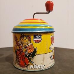 J Chein vintage wind up toys round tin toy music box. 1930's -1940's