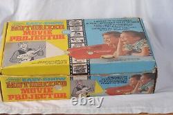 Kenner easy show motorized projector with films & original box as is vintage
