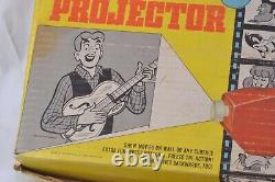 Kenner easy show motorized projector with films & original box as is vintage