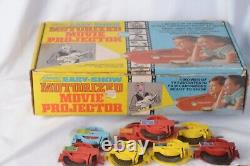 Kenner easy show motorized projector with films & original box as is vintage