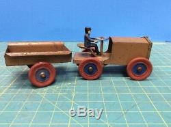 Kingsbury pressed steel wind-up J. C. Penny Little Jim Brown Tractor & Trailer